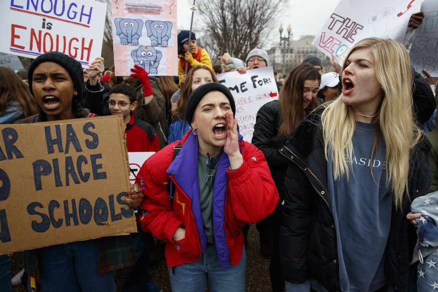 Jane Schwartz, 17, of West Springfield, Va., center, screams during a protest in favor of gun control reform in front of the White House, Monday, Feb. 19, 2018, in Washington. (AP Photo/Evan Vucci)
