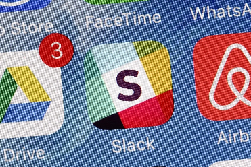 FILE - In this Tuesday, Jan. 31, 2017, file photo, the Slack app is displayed on a mobile phone in New York. Work messaging platform Slack is taking the next step in filing to go public, the latest in ...