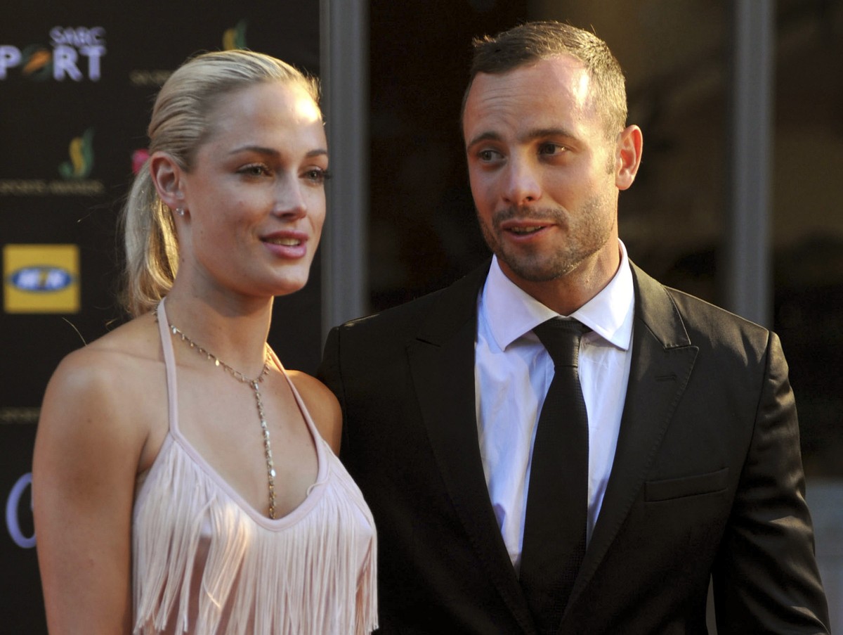 FILE - In this Nov. 4, 2012 file photo, South African Olympic athlete Oscar Pistorius, right, and Reeva Steenkamp arrive for an awards ceremony in Johannesburg, South Africa. Pistorius could be grante ...