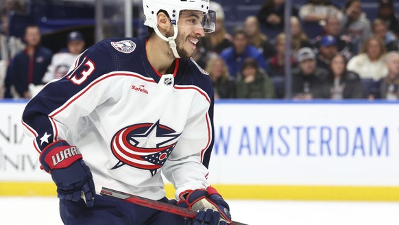Columbus Blue Jackets left wing Johnny Gaudreau smiles after scoring a goal against the Buffalo Sabres during the first period of an NHL hockey game Tuesday, Dec. 19, 2023, in Buffalo, N.Y. (AP Photo/ ...