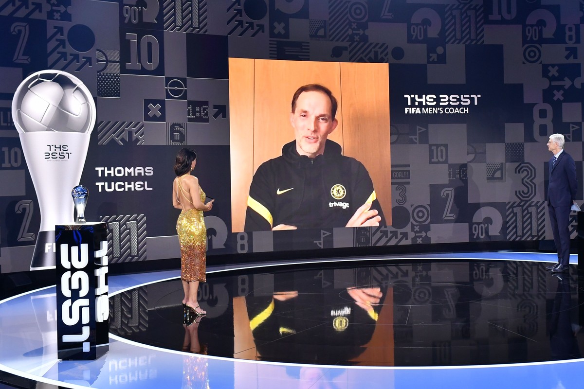The Best FIFA Men's Coach 2021 award winner Thomas Tuchel speaks with FIFA Chief of Global Football Development Arsene Wenger and presenter Reshmin Chowdhury during the Best FIFA Football Awards  ...