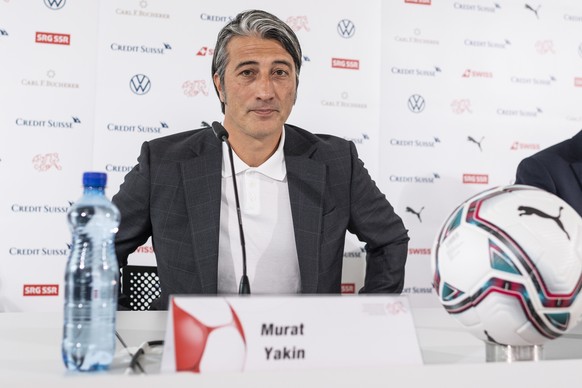 Swiss soccer coach Murat Yakin arrives to a press conference where he is presented as the new coach of Switzerland's national team in Muri, Switzerland, Monday, August 9, 2021. The former player ...