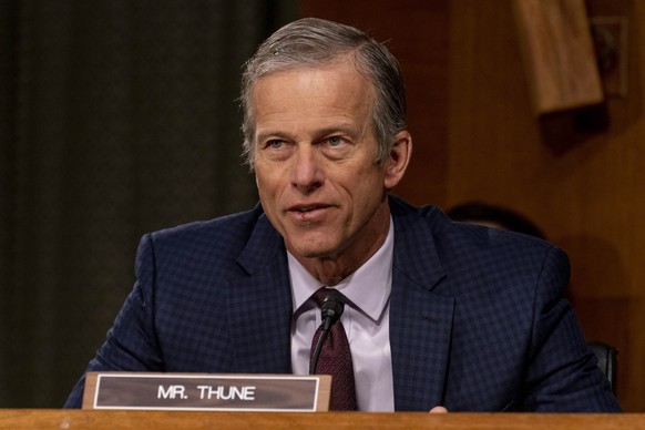 epa08949179 Sen. John Thune, R-S.D. speaks during a Senate Finance Committee hearing to examine the expected nomination of Janet Yellen to be Secretary of the Treasury on Capitol Hill in Washington, D ...