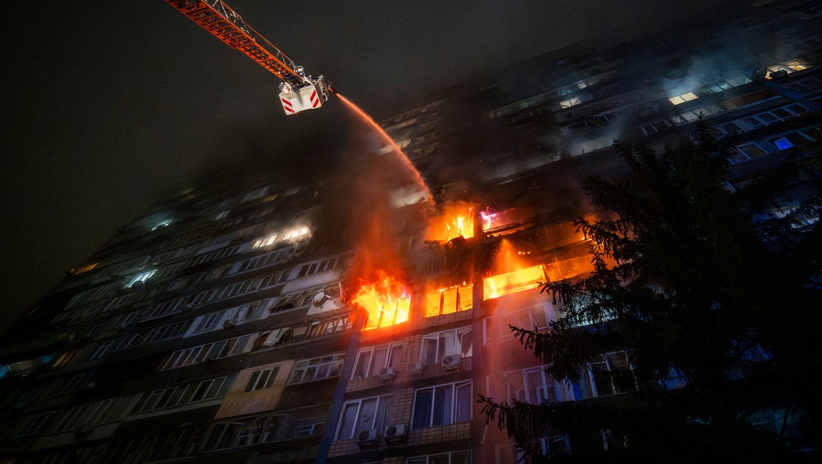 KEYPIX - Emergency services personnel work to extinguish a fire following a Russian attack in Kyiv, Ukraine, Friday, Oct. 10, 2025. (AP Photo/Dan Bashakov)