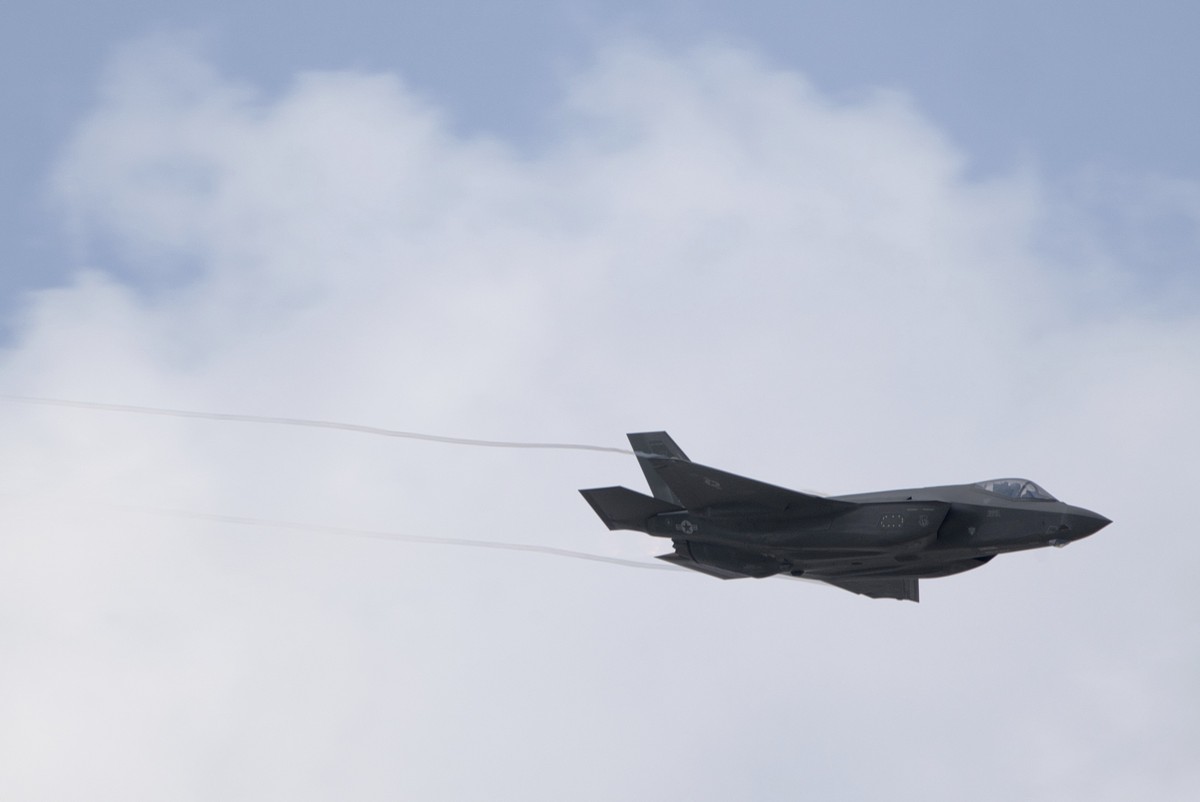 An F-35 Lightning conducts a fly-by at the Dubai Air Show in Dubai, United Arab Emirates, Thursday, Nov. 16, 2023. (AP Photo/Jon Gambrell)