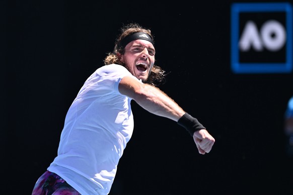 epa10416964 Stefanos Tsitsipas of Greece celebrates match point against Tallon Griekspoor of the Netherlands during their third round match at the 2023 Australian Open tennis tournament at Melbourne P ...