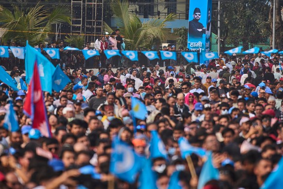 Supporters of the Rastriya Swatantra Party wait for the arrival of rapper-turned-politician Balendra Shah during an election campaign rally in Chitwan, approximately 180 kilometers (112 miles) west of ...