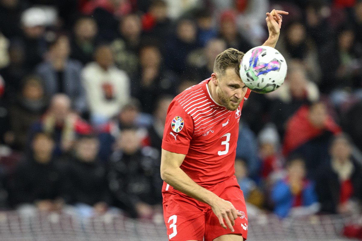 Switzerland's defender Silvan Widmer scores the 3 - 0 goal during the UEFA Euro 2024 qualifying group I soccer match between Switzerland and Israel, at the Stade de Geneve, in Geneva, Switzerland ...