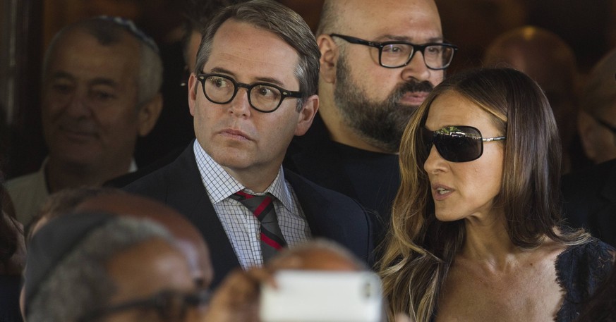 Actors Matthew Broderick (L) and Sarah Jessica Parker depart the funeral of comedian Joan Rivers at Temple Emanu-El in New York September 7, 2014. REUTERS/Lucas Jackson (UNITED STATES - Tags: ENTERTAI ...