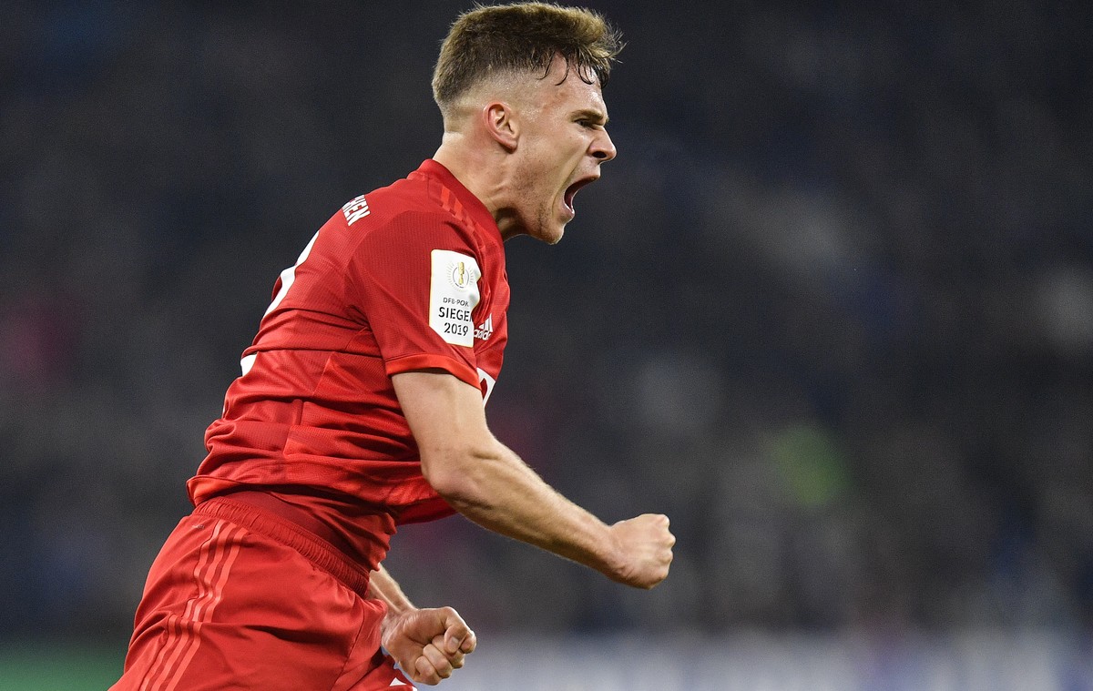 Bayern's Joshua Kimmich celebrates after scoring the opening goal during the German soccer cup, DFB Pokal, quarter-final match between FC Schalke 04 and Bayern Munich in Gelsenkirchen, Germany, T ...