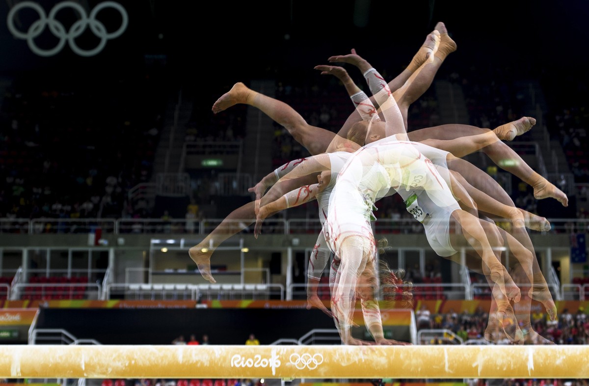 epa05461902 A multi exposure photo of Switzerland's Giulia Steingruber competing on the balance beam during the women's Individual All-Around qualification of the Rio 2016 Olympic Games Arti ...