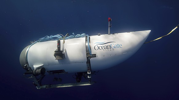 FILE - This photo from OceanGate Expeditions shows a submarine named Titan used to visit the Titanic wreck.  The wrecks of the Titanic and the Titan lie on the ocean floor...