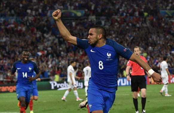 epa05368303 Dimitri Payet of France celebrates after scoring the 2-0 goal during the UEFA EURO 2016 group A preliminary round match between France and Albania at Stade Velodrome in Marseille, France,  ...