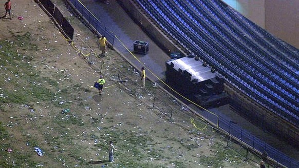 This photo provided by NBC10 shows caution tape placed across a gap in railing after a concert by Snoop Dogg and Wiz Khalifa at the BB&amp;T Pavilion in Camden, N.J., Friday, Aug. 5, 2016. Authorities ...