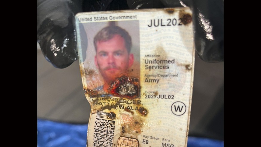This undated photo, provided by the Las Vegas Police Department shows an ID belonging to Matthew Livelsberger, found inside a Tesla Cybertruck involved in an explosion outside the Trump Hotel in Las V ...