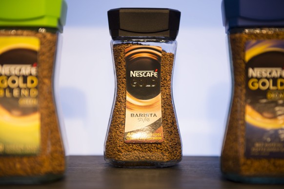 epa04448940 Nescafe coffee is pictured in a show room during the Nine-Month Sales press conference of the world&#039;s biggest food and beverage company, Nestle Group, in Vevey, Switzerland, 16 Octobe ...