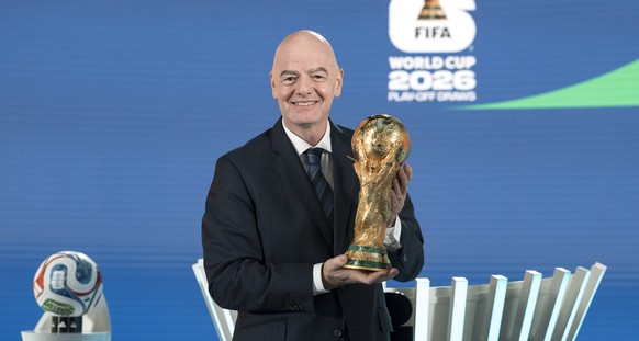 Gianni Infantino, FIFA president poses with the FIFA World Cup Trophy during the FIFA World Cup 2026 Playoff Draw on Thursday, 20. November 2025 in the Home of FIFA in Zuerich, Switzerland. (KEYSTONE/ ...