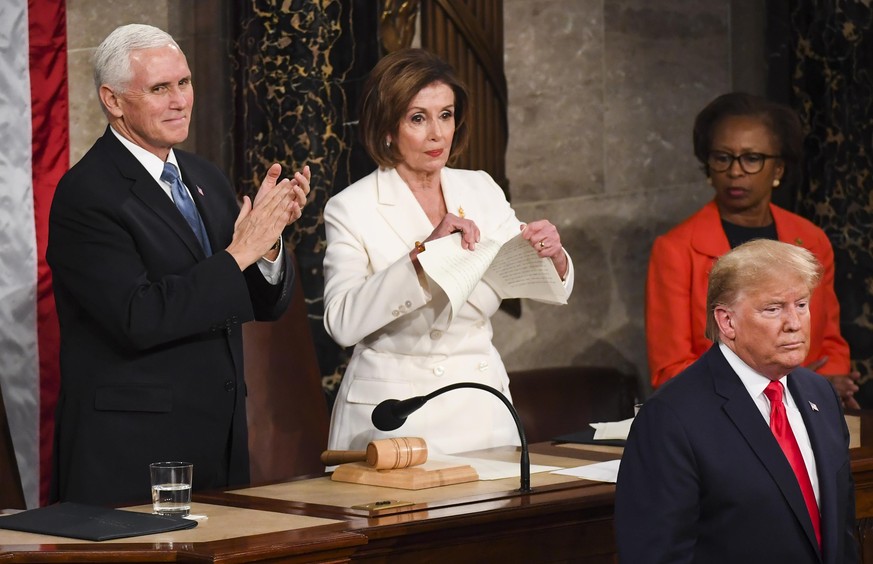 WASHINGTON, DC - FEBRUARY 04: House Speaker Nancy Pelosi (D-Calif.) rips tears up her advanced copy of President Donald J. Trump's State of the Union address before members of Congress in the Hou ...