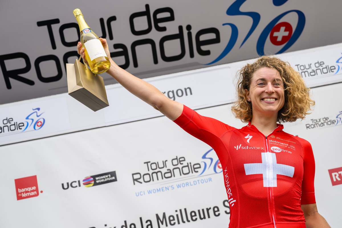 Marlen Reusser from Switzerland of team SD Worx celebrates on the podium during the second stage, a 110,8 km race between Romont and Torgon at the women's Tour de Romandie Feminin UCI World Tour  ...