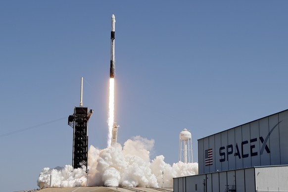 A SpaceX Falcon 9 rocket with the Crew Dragon capsule attached, lifts off with the first private crew from Launch Complex 39A Friday, April 8, 2022, at the Kennedy Space Center in Cape Canaveral, Fla. ...