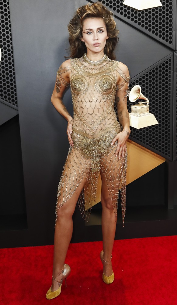 epa11127838 US musician Miley Cyrus arrives for the 66th annual Grammy Awards ceremony at Crypto.com Arena in Los Angeles, California, USA, 04 February 2024. EPA/CAROLINE BREHMAN