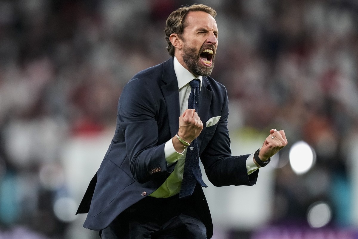 England's manager Gareth Southgate celebrates after winning the Euro 2020 soccer championship semifinal match against Denmark at Wembley stadium in London, Wednesday, July 7, 2021. (AP Photo/Fran ...