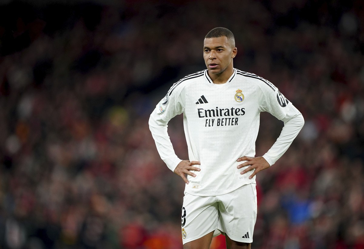 Real Madrid's Kylian Mbappe stands on the pitch during the Champions League opening phase soccer match between Liverpool and Real Madrid at Anfield Stadium, Liverpool, England, Wednesday, Nov. 27 ...
