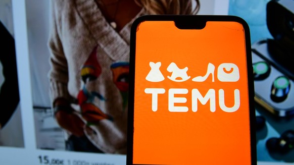 Temu company logo displayed in France - 07 Feb 2025 In this photo illustration, Chinese website for online commerce Temu is seen displayed on a smart phone screen. France Copyright: xRomainxDoucelinx/ ...