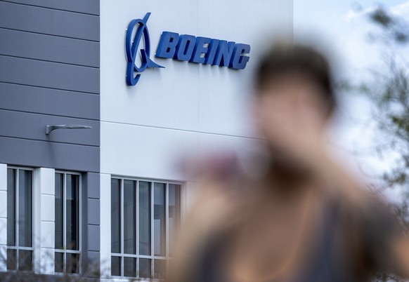 epa11217135 A person runs near the Boeing Distribution Services Inc. HQ in Hialeah, Florida, USA, 12 March 2024. According to officials in Charleston, South Carolina, John Barnett, a former Boeing emp ...