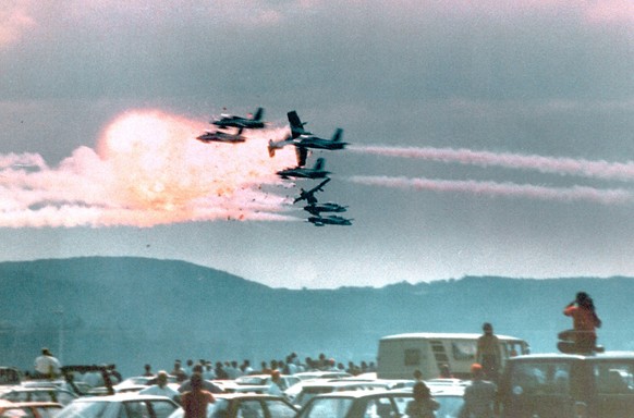 Jets of the Italian aerobatic squad &#039;Frecce Tricolori&#039; colliding in the air over the Ramstein Air Base, where they were participatig in an Air-Show, pictured on August 28, 1988. The accident ...