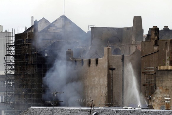 Firefighters at work at the Mackintosh Building at the Glasgow School of Art on Saturday June 16, 2018. Firefighters sought to limit damage to the historic Glasgow School of Art Saturday, after a dram ...