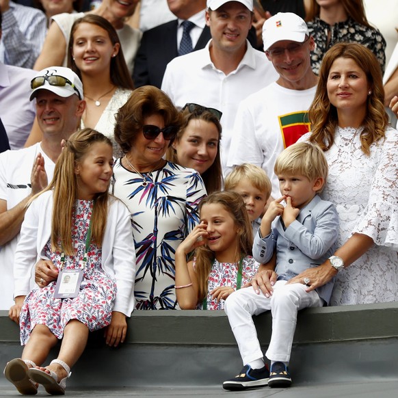 epa06091312 Roger Federer&#039;s wife Mirka (C) and the children react after Roger Federer of Switzerland won against Marin Cilic of Croatia during the Men&#039;s final match for the Wimbledon Champio ...