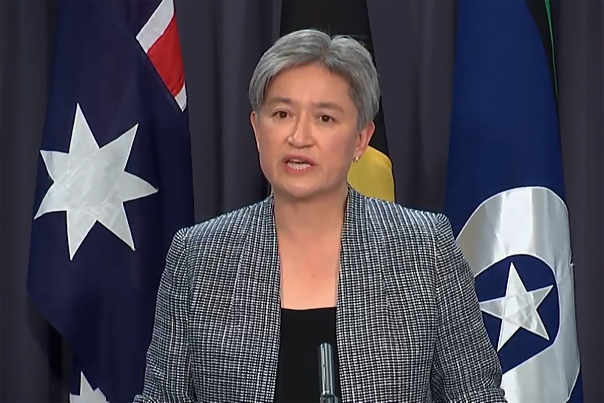 In this image taken from video, Australian Foreign Minister Penny Wong speaks during a press conference, Tuesday, Oct. 18, 2022, in Canberra, Australia. Wong announced Australia has reversed a previou ...