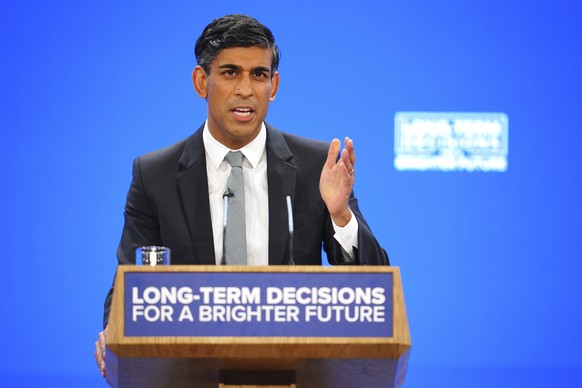 Britain&#039;s Prime Minister Rishi Sunak gestures as he speaks during the Conservative Party annual conference at Manchester Central convention complex in Manchester, England, Wednesday, Oct. 4, 2023 ...
