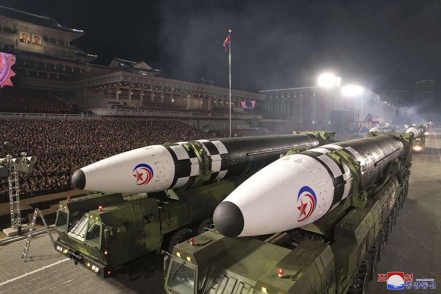 This photo provided by the North Korean government, shows what it says intercontinental ballistic missiles during a military parade to mark the 75th founding anniversary of the Korean People?s Army on ...