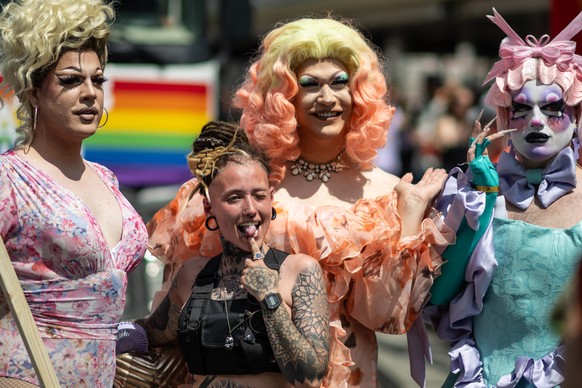epa10696575 Participants attend the Rainbow Parade in Vienna, Austria, 17 June 2023. The Rainbow Parade, a rally against the discrimination of lesbian, gay, bisexual, transgender, intersex, queer/ques ...