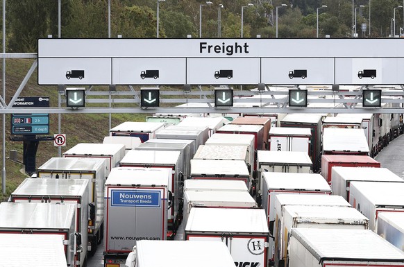 A view of lorries queuing for the Eurotunnel in Folkestone, Kent, England, Friday, Sept. 25, 2020, as the government develops the 27-acre site near Ashford into a post-Brexit lorry park as it gears up ...