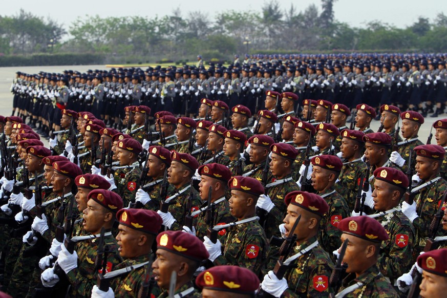 Myanmar military officers march during a parade to commemorate the Myanmar&#039;s 72nd Armed Forces Day in Naypyitaw, Myanmar, Monday, March 27, 2017. Myanmar marks 72nd Armed Forces Day, which commem ...