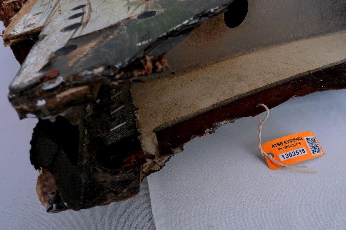 KUALA LUMPUR, MALAYSIA - MARCH 3: Debris from the wing flap part of Malaysia Airlines with an identification tag had found in Pemba Island, Tanzania display on the table during 5 Years of Remembrance  ...