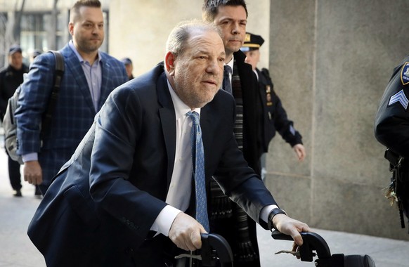 FILE - Harvey Weinstein arrives at a Manhattan courthouse as jury deliberations continue in his rape trial in New York, on Feb. 24, 2020. A New York appellate court on Thursday, June 2, 2022, has uphe ...