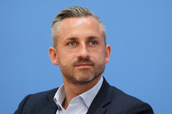 Top candidate for the Saxony-Anhalt state elections Ulrich Siegmund, center, attends a press conference in Berlin, Germany, Monday, Sept. 7, 2026. (AP Photo/Ebrahim Noroozi)
Germany Election
