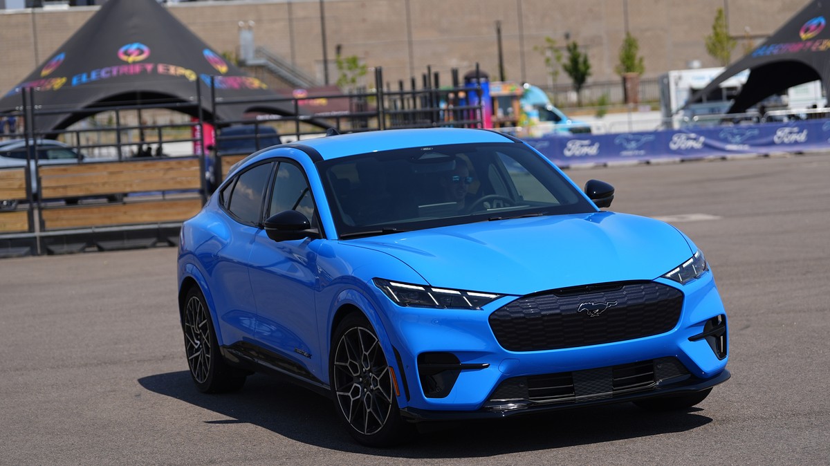 A motorist puts an electric 2024 Ford Mustang Mach-E through its paces on a test track at the Electrify Expo in The Yards Sunday, July 14, 2024, in north Denver. Ford reports earnings on Wednesday, Ju ...