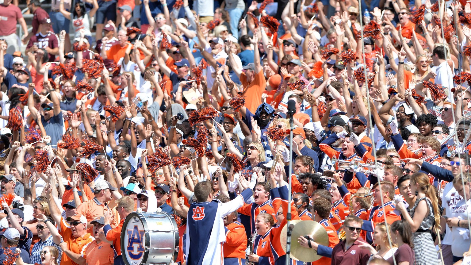 September 21, 2019: Auburn Tigers fans cheering for their team during the game between the Auburn University Tigers and the Texas A&amp;M University Aggies at Kyle Field Stadium in College Station, TX ...