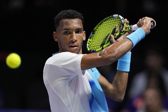 Canada&#039;s Felix Auger-Aliassime of Kites, returns the ball to Germany&#039;s Alexander Zverev of Hawks, during the final day of the World Tennis League at Coca-Cola Arena, in Dubai, United Arab Em ...