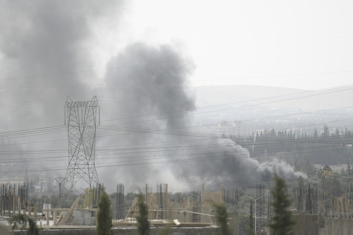Smoke rises in the countryside of Damascus, Syria, on Saturday Oct 30, 2021, following what Syrian state media said was an Israeli airstrike. According to SANA, the country's air defenses respond ...