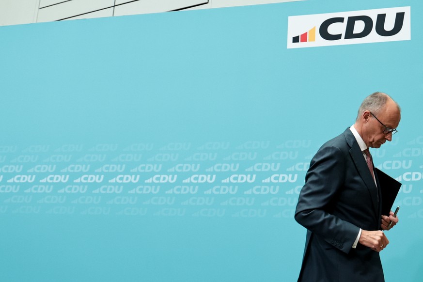 epa13254049 German Chancellor and leader of the Christian Democratic Union (CDU) Friedrich Merz leaves after a press conference at CDU party's headquaters after a CDU party board meeting in Berli ...