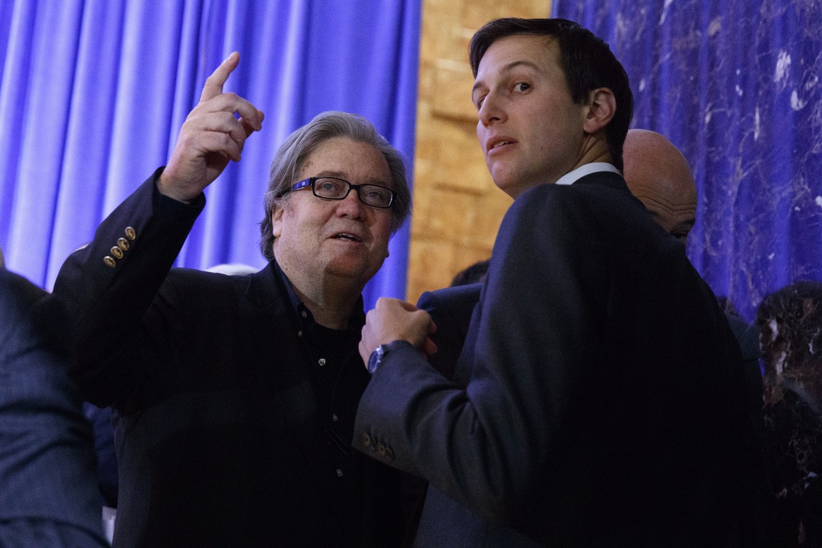 Steve Bannon, chief strategist for President-elect Donald Trump, left, talks with Jared Kushner before the start of a President-elect Donald Trump's news conference in the lobby of Trump Tower in ...