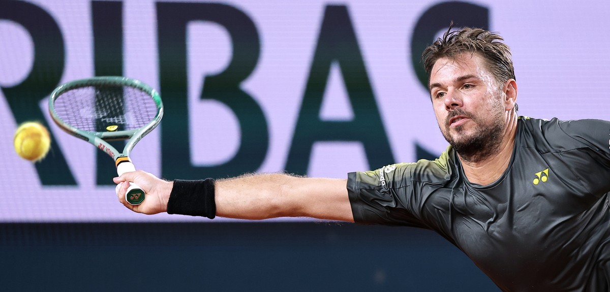 epa11378329 Stan Wawrinka of Switzerland in action during his Men's Singles 2nd round match against Pavel Kotov of Russia during the French Open Grand Slam tennis tournament at Roland Garros in P ...