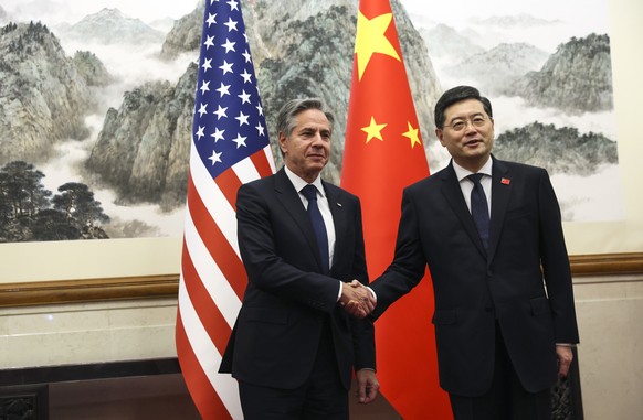 U.S. Secretary of State Antony Blinken, left, shakes hands with Chinese Foreign Minister Qin Gang, right, at the Diaoyutai State Guesthouse in Beijing, China, Sunday, June 18, 2023. (Leah Millis/Pool  ...