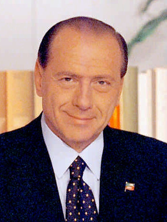 I15-19960422-ACCORE, (Milan), Italy: The leader of the Italian right-wing "Polo delle Liberta'" parties alliance, former Prime Minister Silvio Berlusconi, smiles during first appearance ...